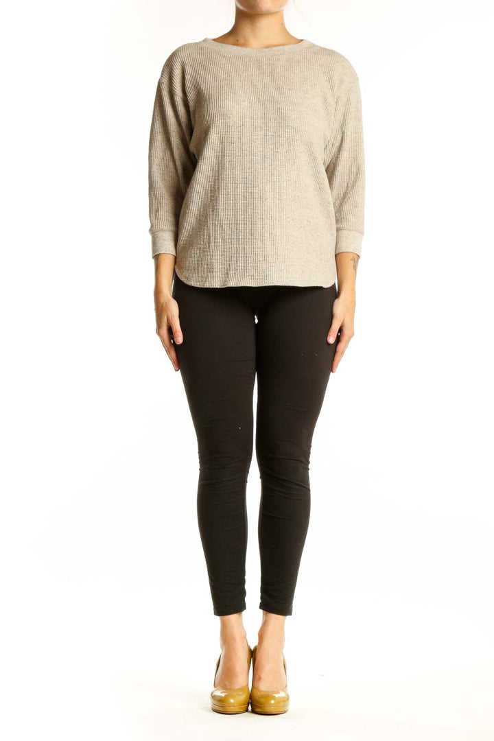 Beige ribbed cotton knit sweater with crew neckline and three-quarter sleeves, front view