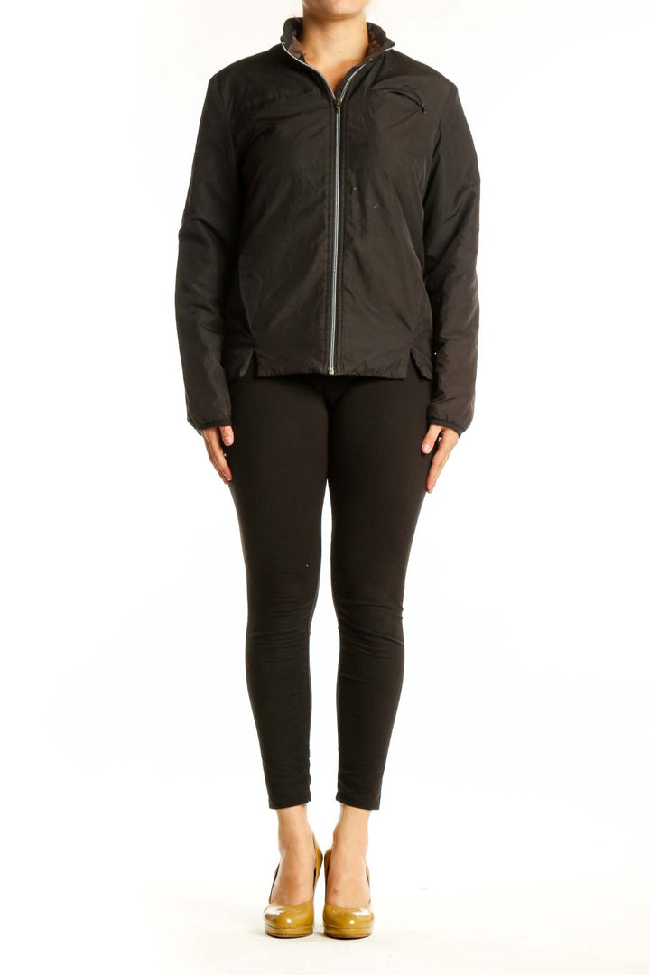 Black puffer jacket with full-length zip closure and stand collar, front view