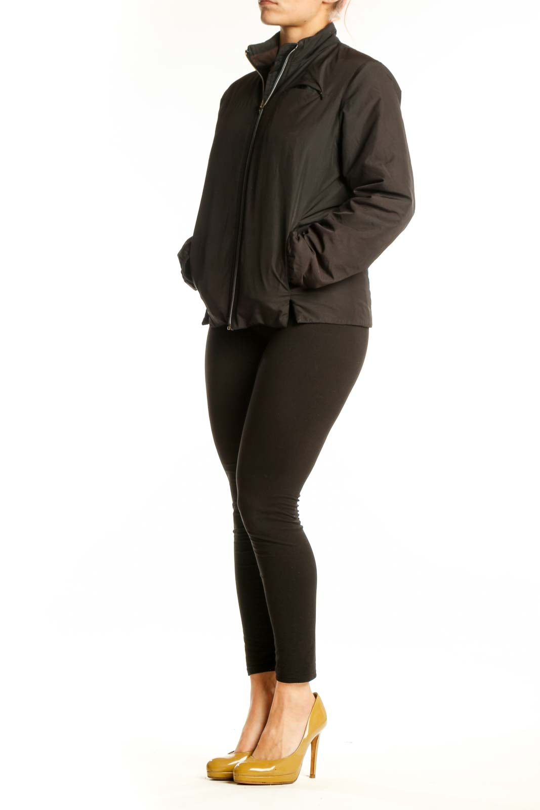 Black puffer jacket with full-length zip closure and stand collar, front view