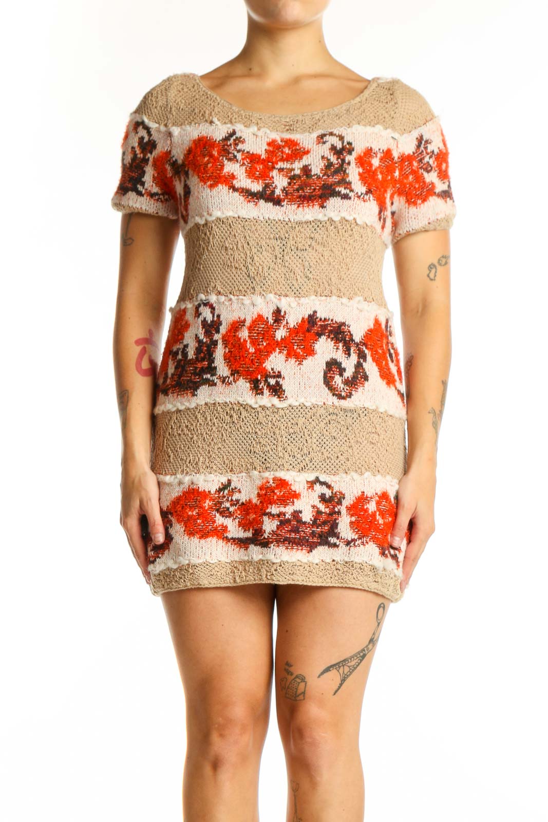 Beige knit sweater dress with red and burgundy floral jacquard horizontal stripes, short sleeves, and fitted silhouette - front view