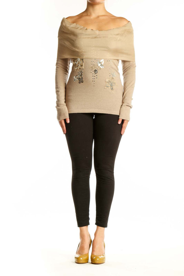 Cream off-shoulder embellished knit top with beaded details and draped cowl neckline, front view