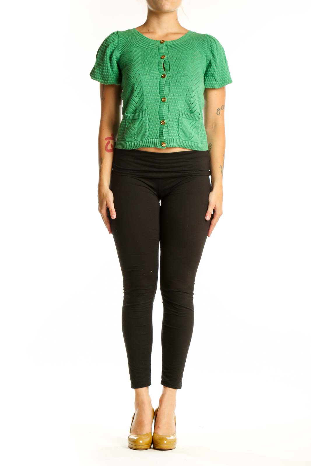 Green knit button-up cardigan with textured cable pattern, puffed sleeves, and gold buttons on model