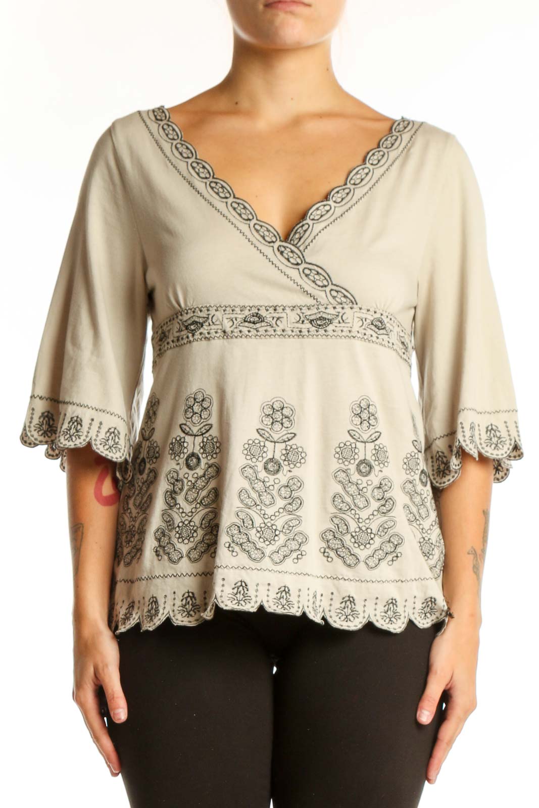 Cream embroidered cotton V-neck top with floral details and bell sleeves by BCBG MaxAzria