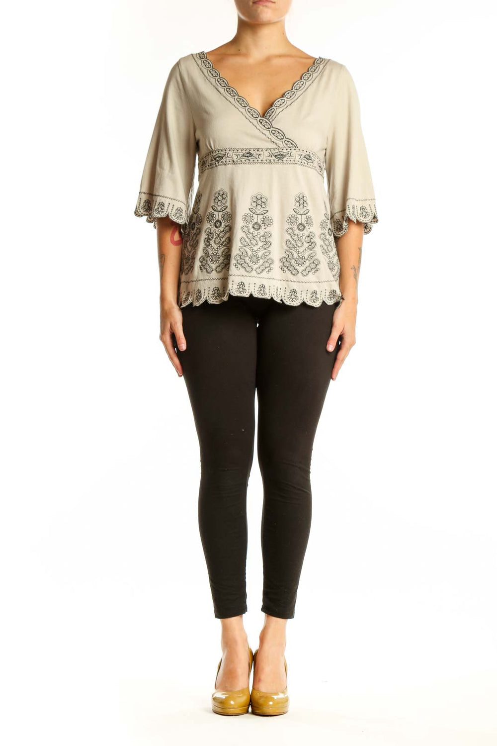 Cream embroidered cotton V-neck top with floral details and bell sleeves by BCBG MaxAzria
