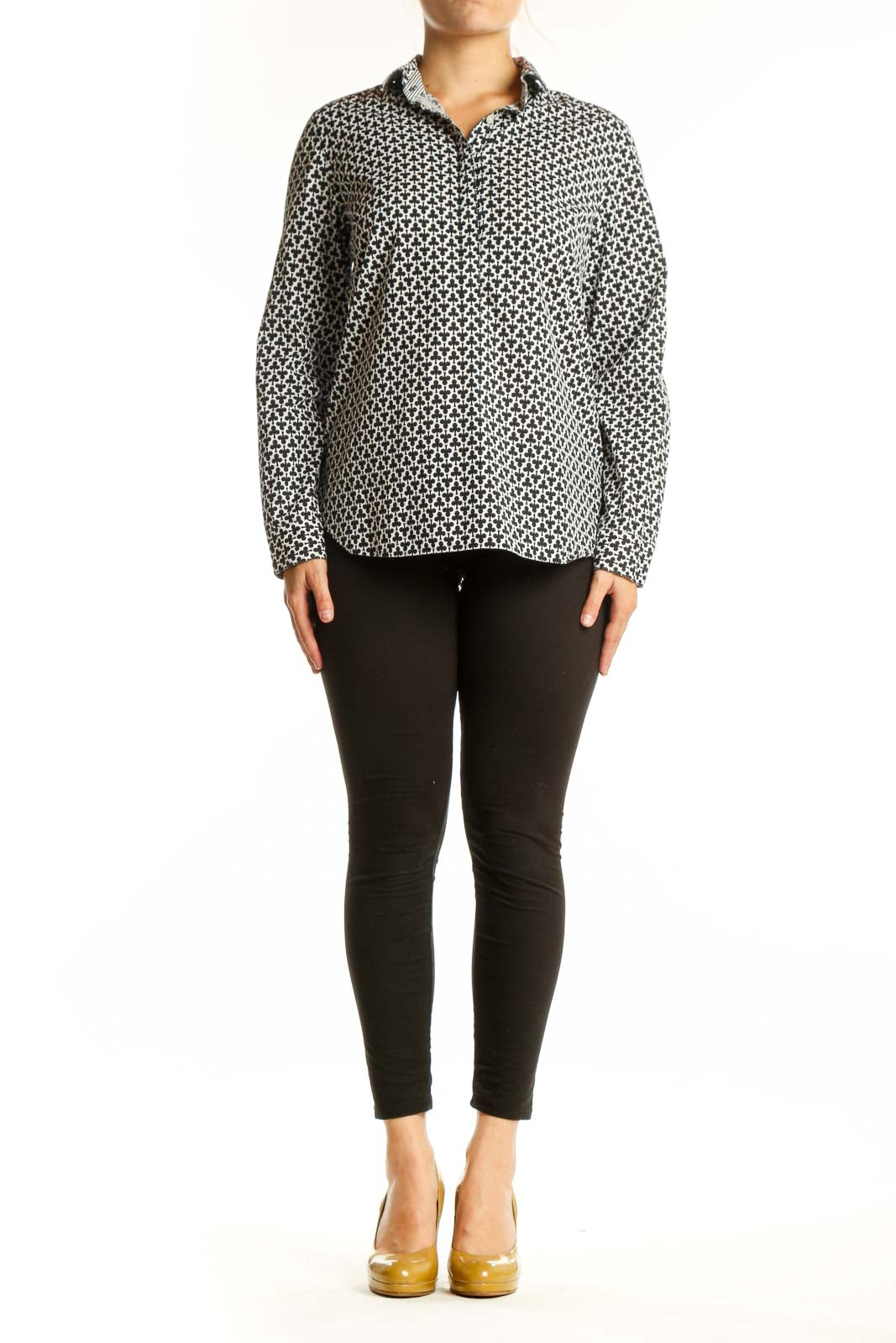 Black and white geometric print button-up shirt with collar and long sleeves, front view