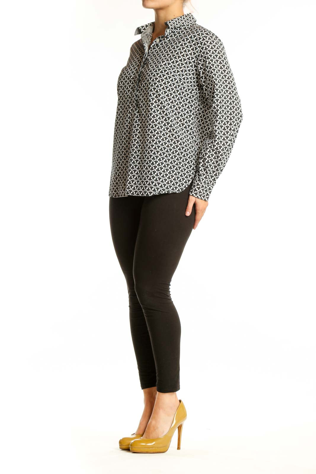 Black and white geometric print button-up shirt with collar and long sleeves, front view