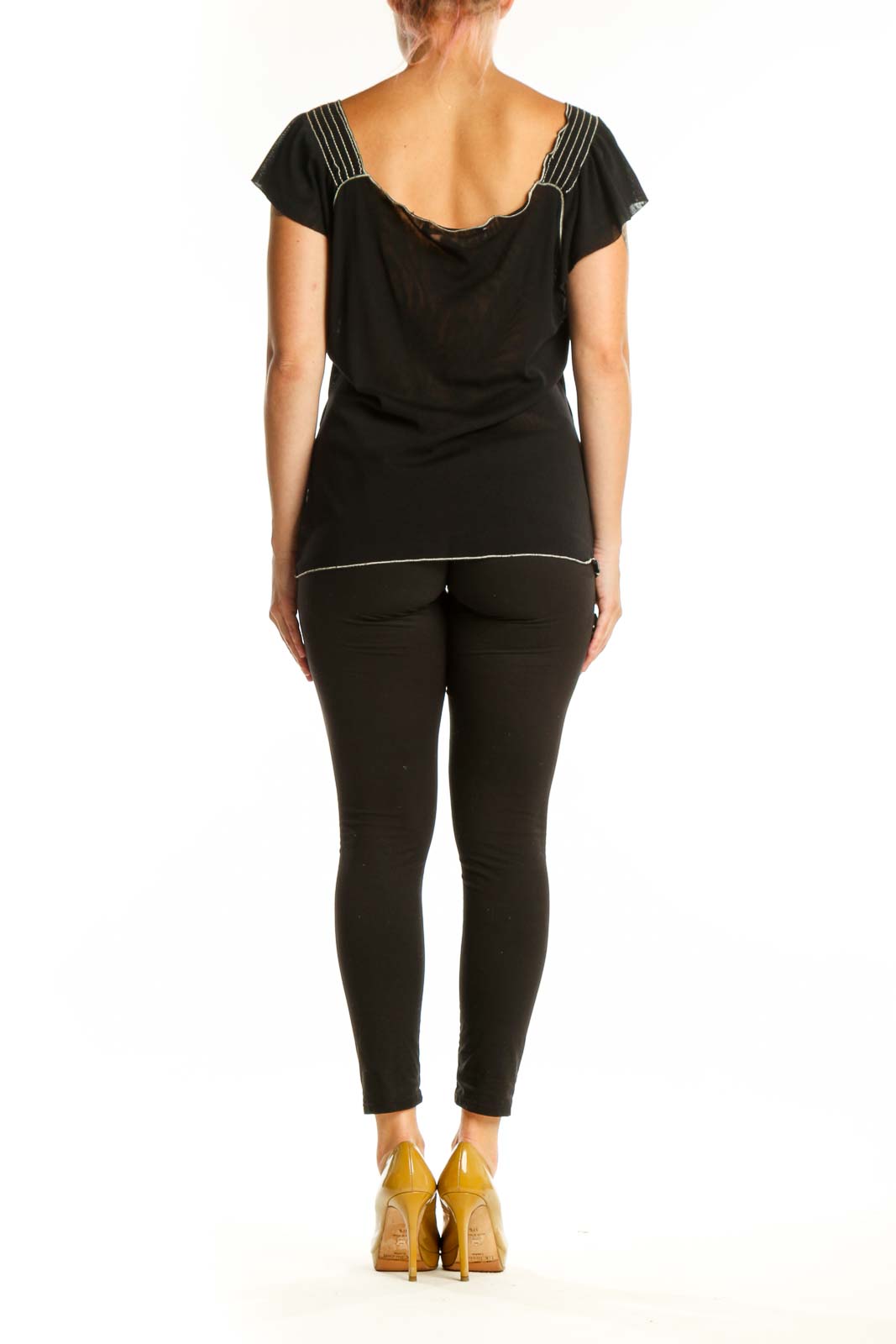 Back view of black flutter sleeve v-neck top showing relaxed fit and contrast stitching