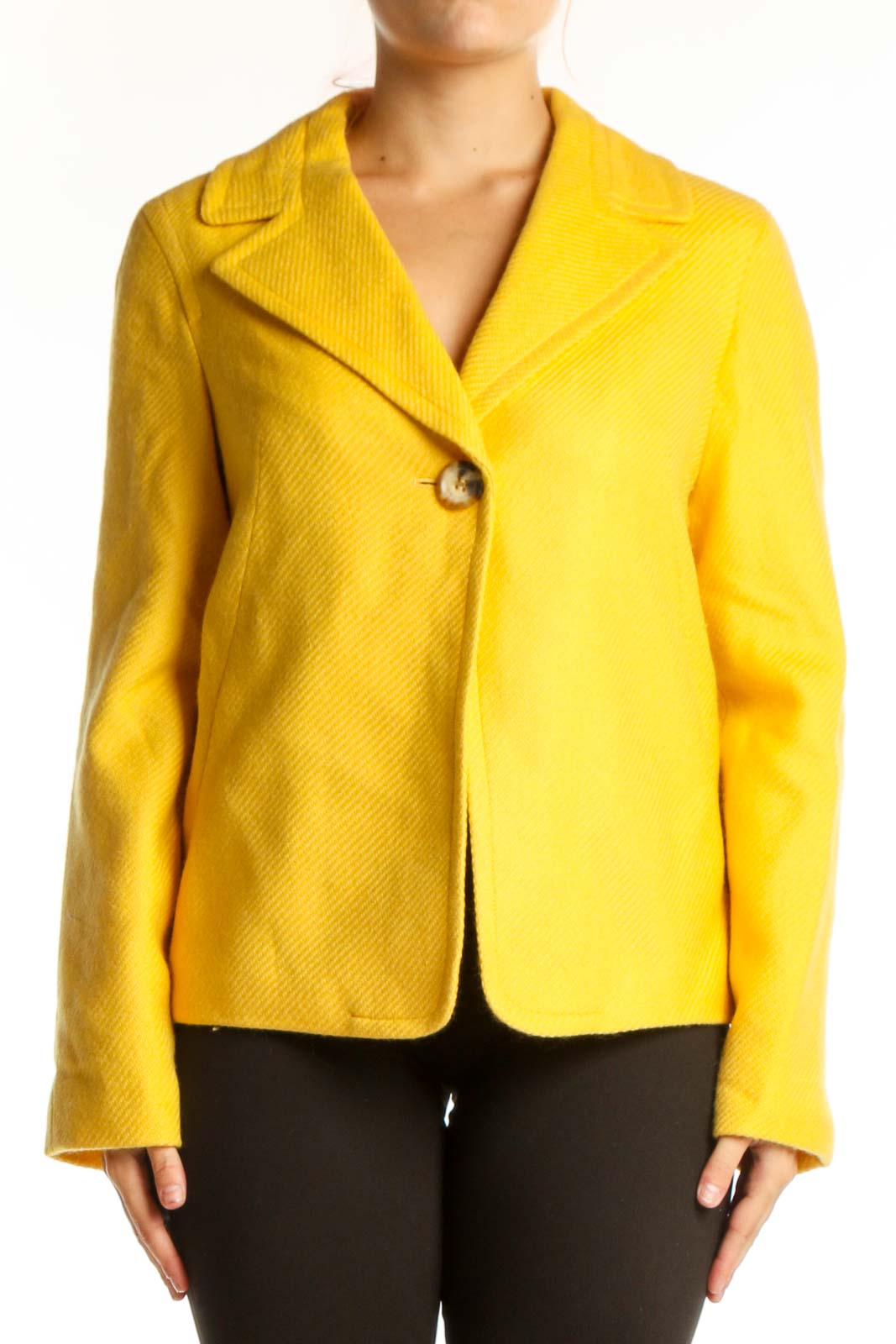 Front view of yellow tailored blazer with single button closure and notched lapels