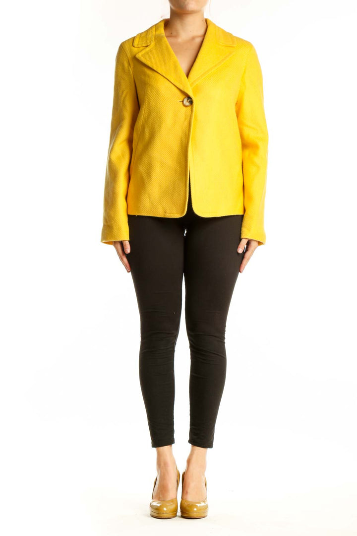 Front view of yellow tailored blazer with single button closure and notched lapels