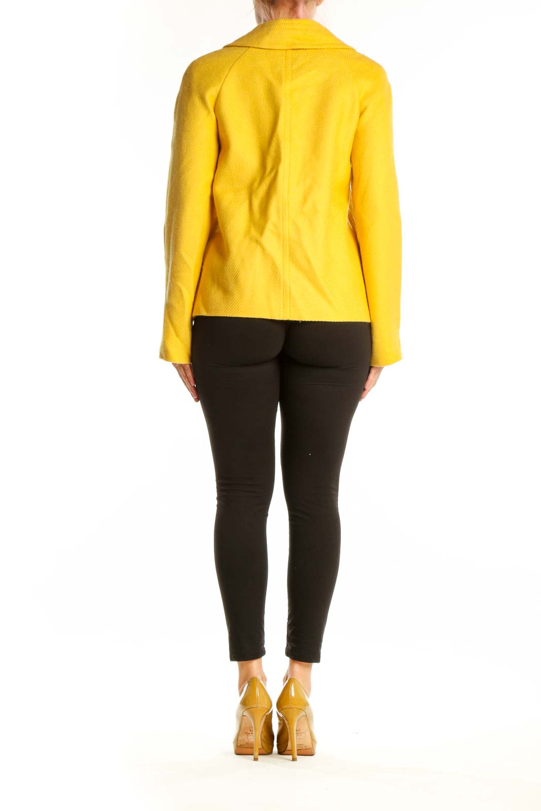 Back view of yellow tailored blazer showing cropped length and structured silhouette