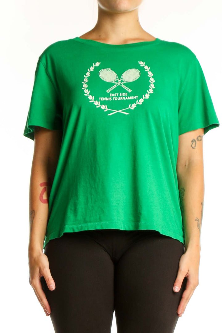 Green J.Crew t-shirt with white tennis racket and laurel wreath graphic design, front view