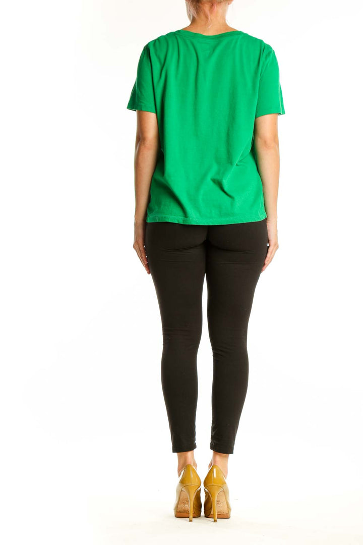 Green J.Crew tennis tournament graphic t-shirt, back view showing relaxed fit