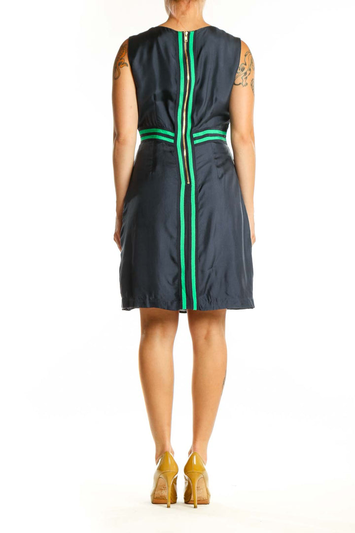 Navy sleeveless dress with neon green stripes, back view showing A-line silhouette