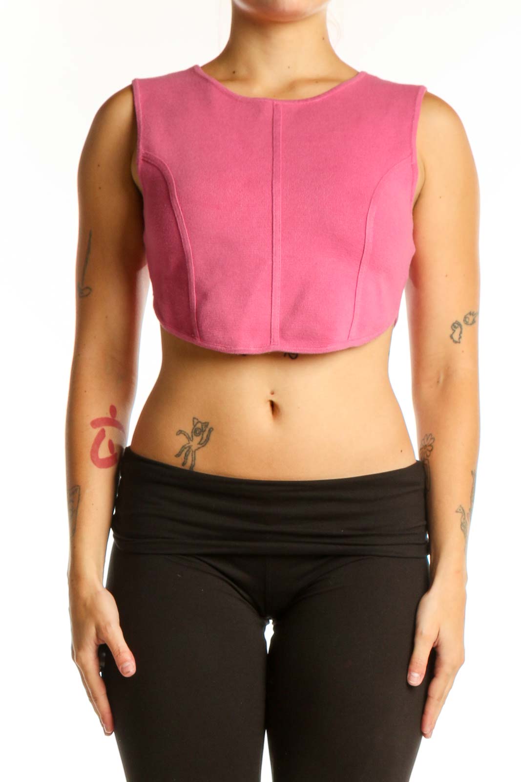 Pink cropped sleeveless knit tank top from House of Harlow 1960, front view on model