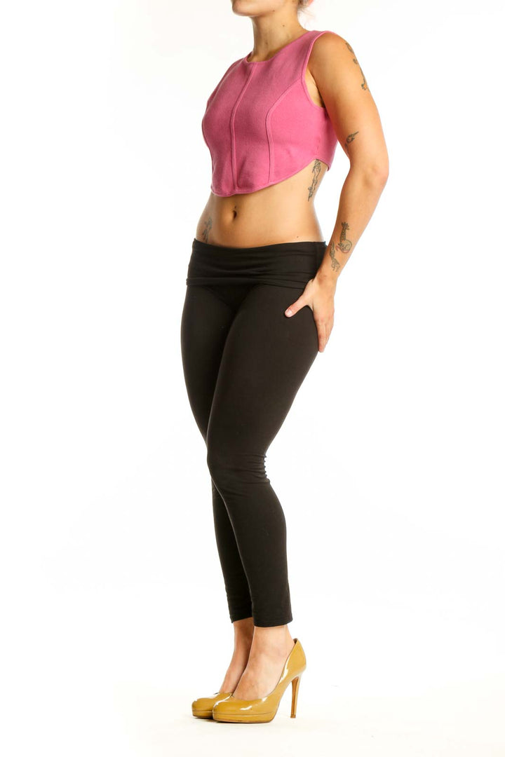 Pink cropped sleeveless knit tank top from House of Harlow 1960, front view on model