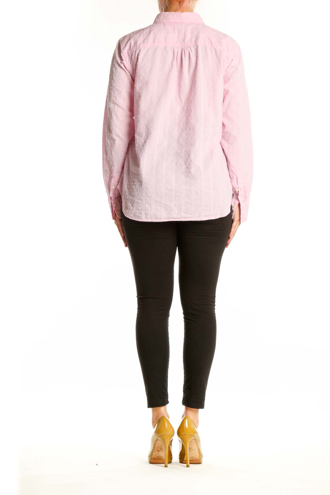 Back view of pink cotton button-down shirt showing relaxed fit and full-length sleeves