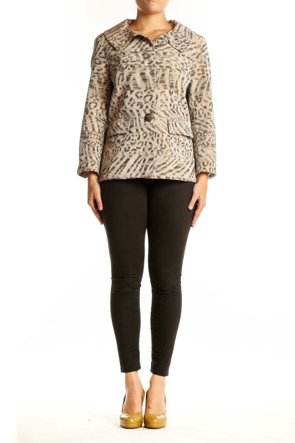 Beige leopard print button-up jacket with collared neckline and tailored waist, worn with black pants