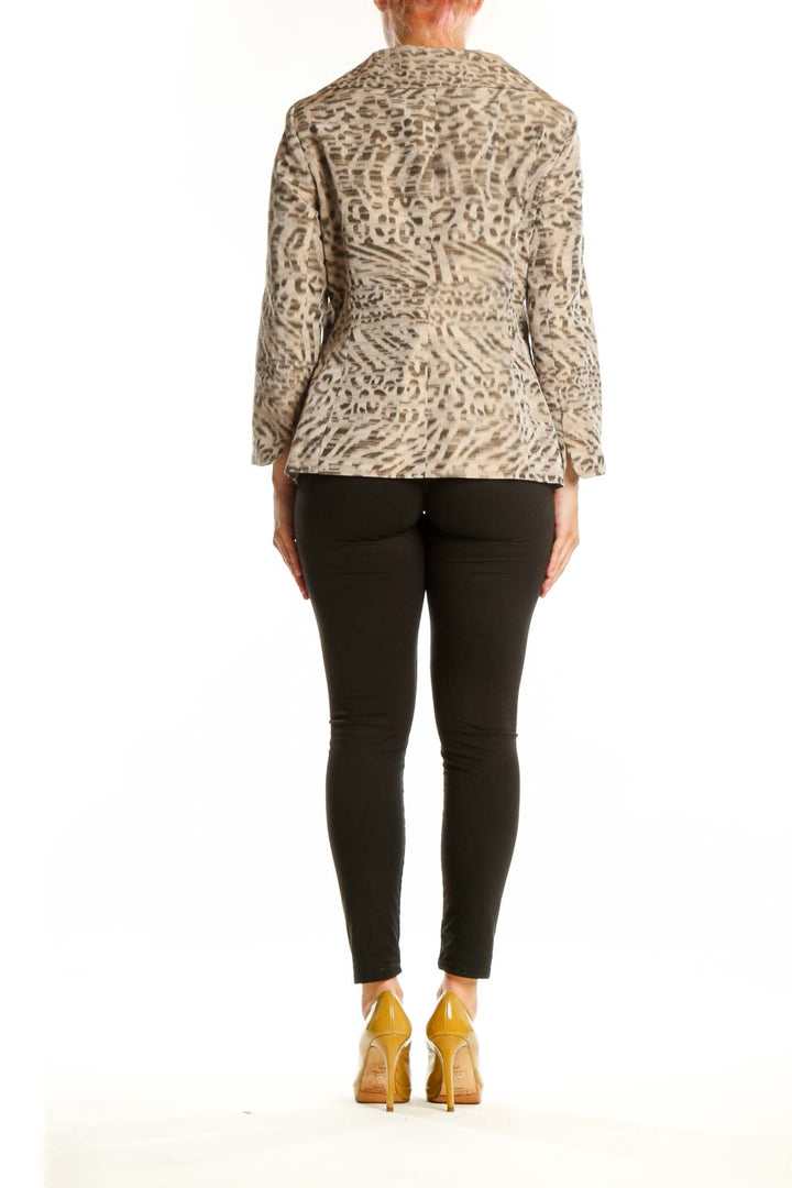 Back view of beige leopard print DonCaster jacket showing structured fit and long sleeves