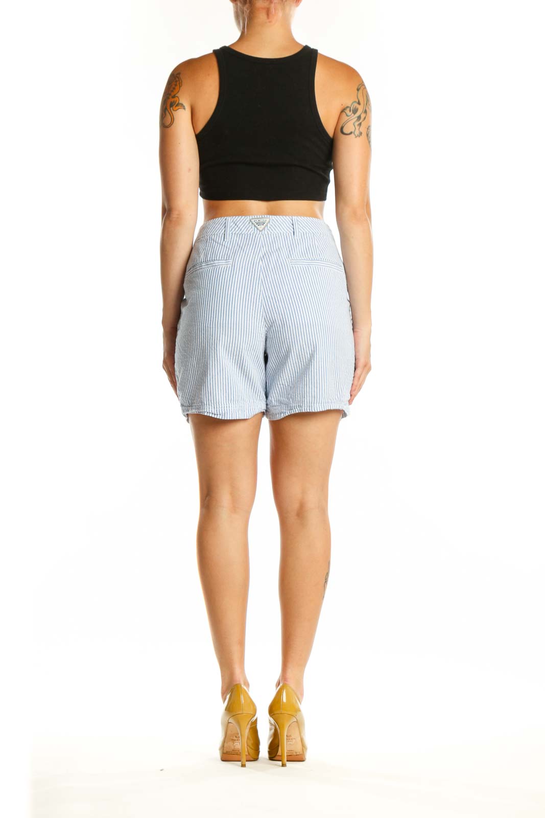 Back view of blue and white striped cotton shorts by Columbia with functional pockets