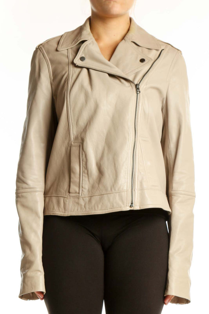 Beige leather biker jacket with asymmetrical zip closure and notched lapels, front view on model