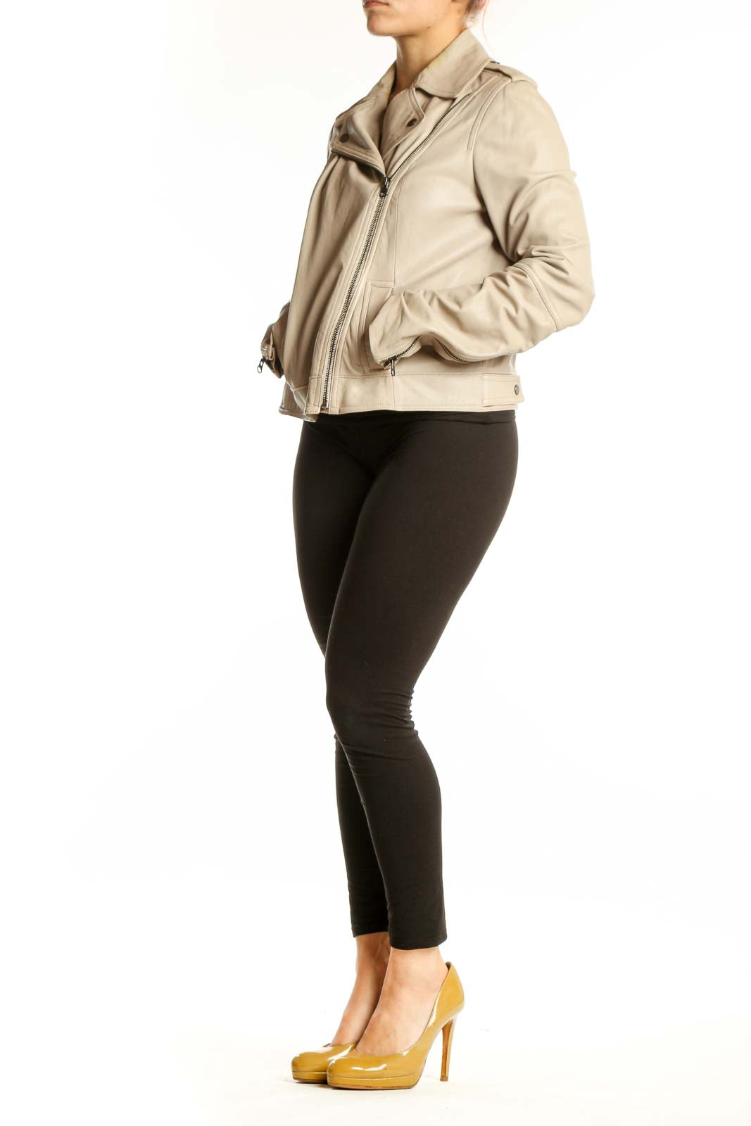Beige leather biker jacket with asymmetrical zip closure and notched lapels, front view on model
