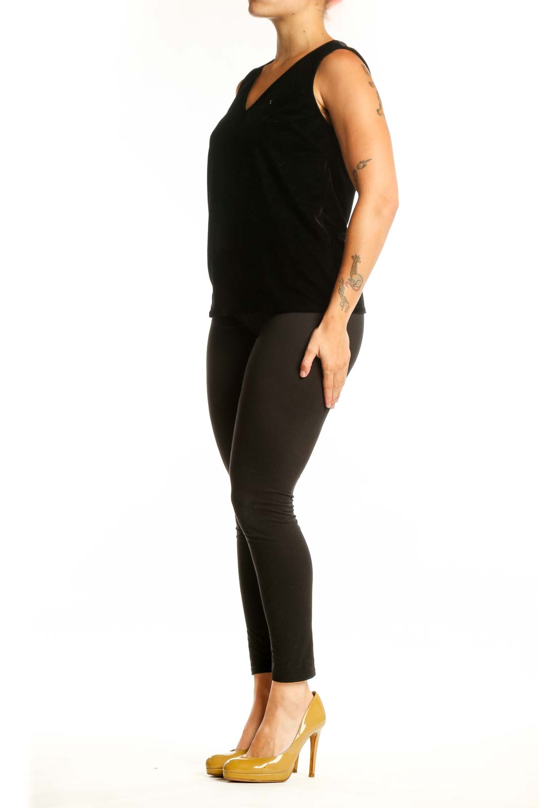 Black velvet sleeveless V-neck top by J.Crew, front view on model