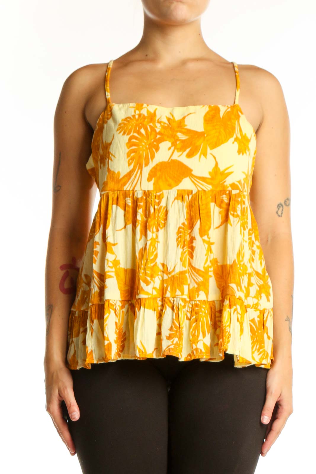 Yellow and cream floral tiered camisole top with spaghetti straps, front view