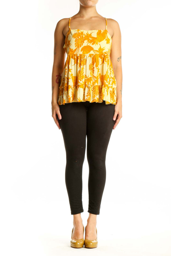 Yellow and cream floral tiered camisole top with spaghetti straps, front view