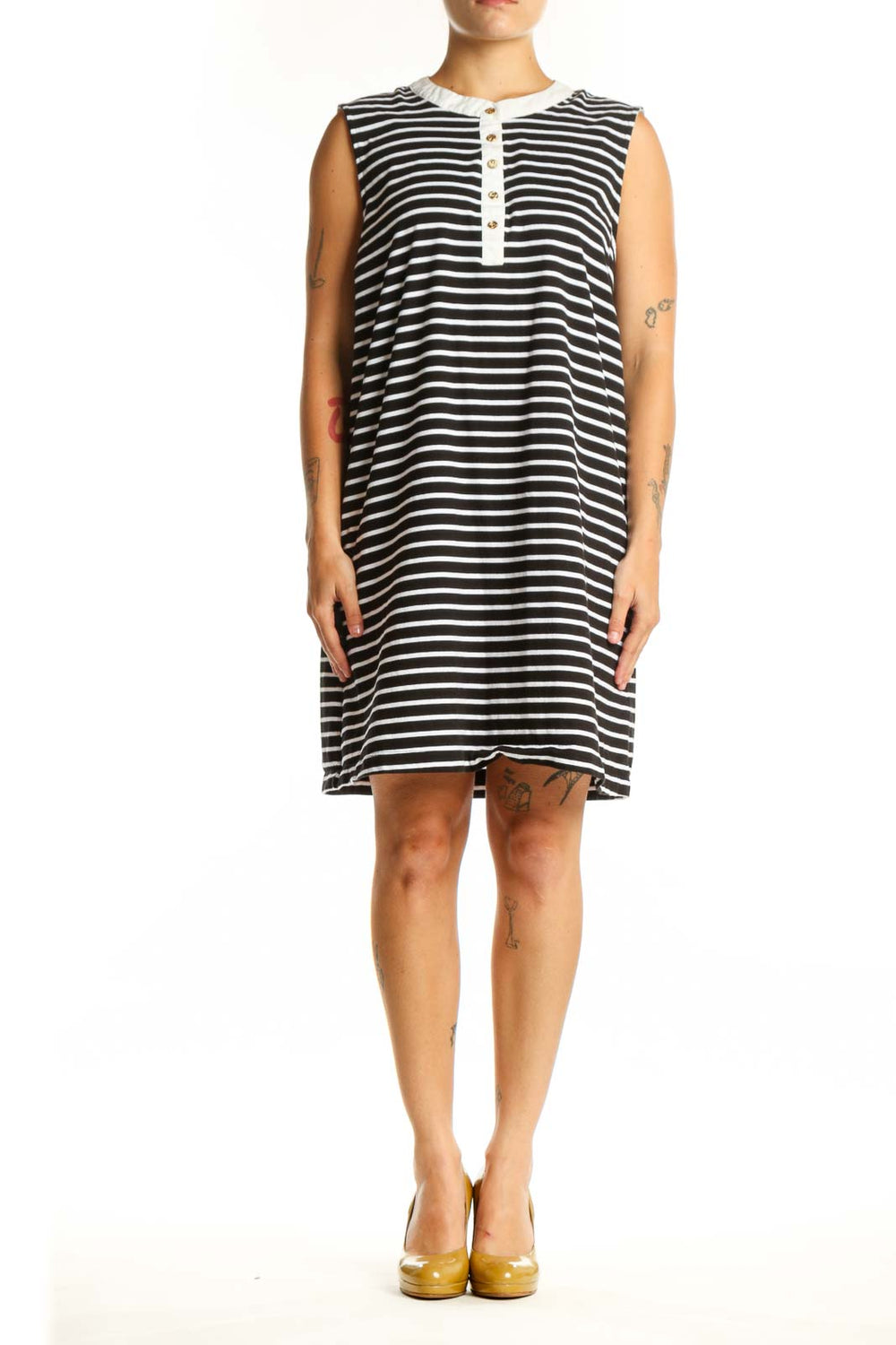Black and white horizontal striped sleeveless cotton dress with white button placket detail, front view
