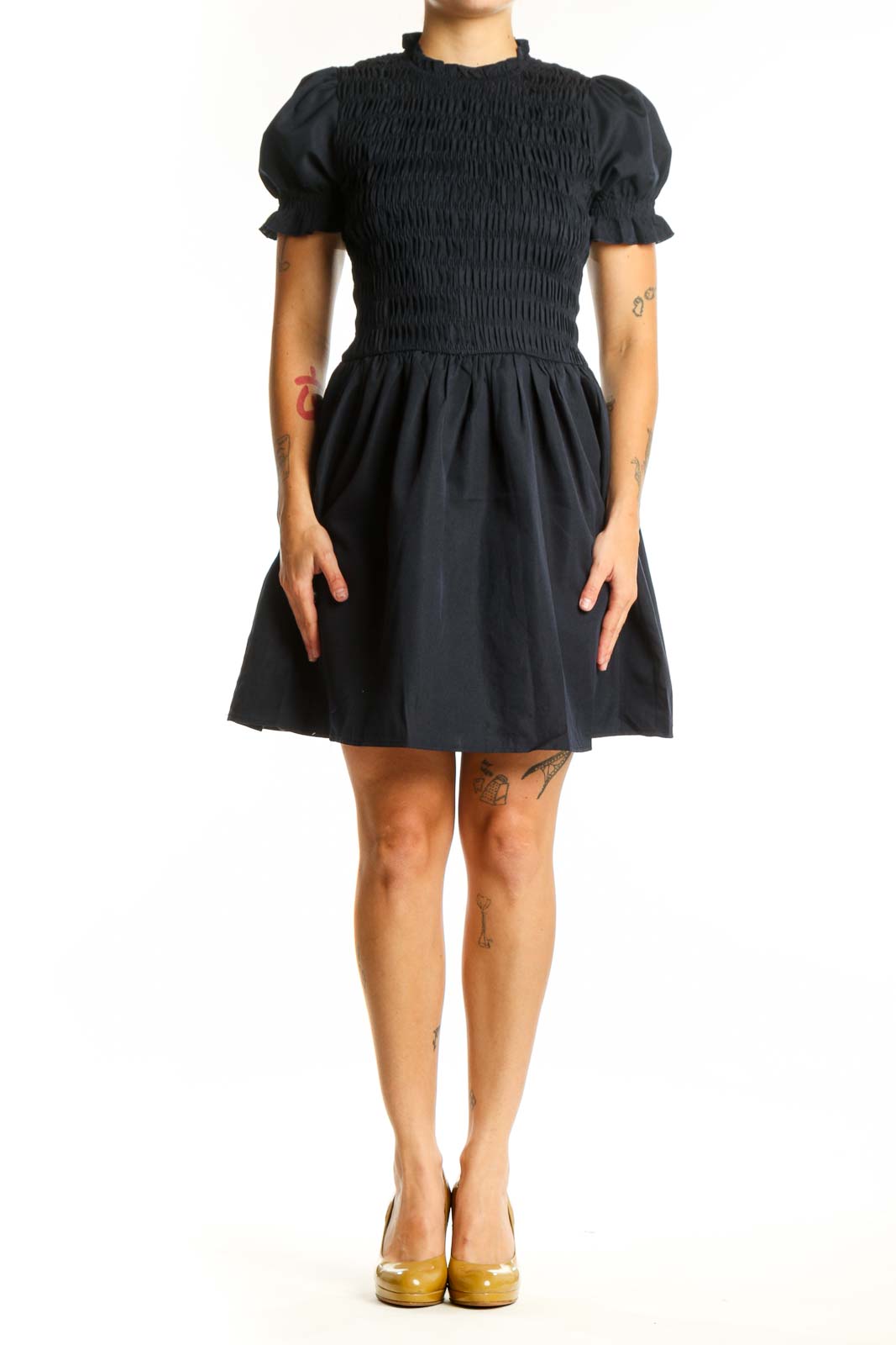 Black puff sleeve smocked fit and flare dress front view, showing fitted bodice and flowing skirt