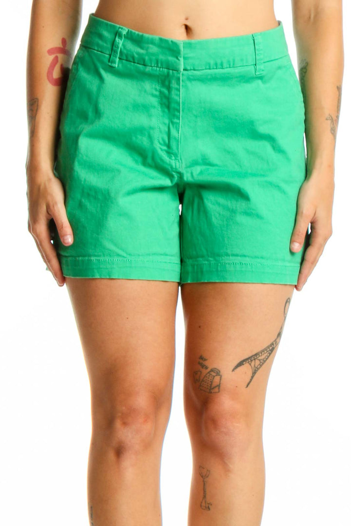 Front view of vibrant green cotton-spandex shorts by Crown & Ivy, size L, featuring classic waistband and mid-thigh length