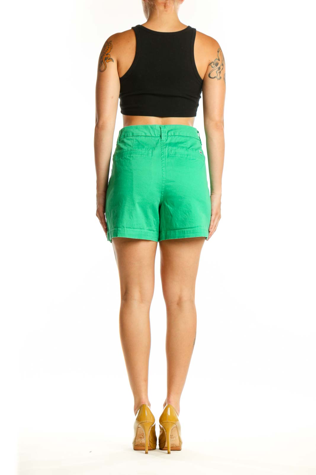 Back view of green shorts by Crown & Ivy showing rear pockets and flattering fit on size L