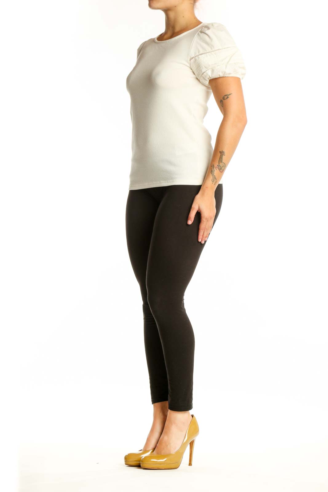 Cream puff sleeve J.Crew top front view on model, showing crew neckline and ruched short sleeves