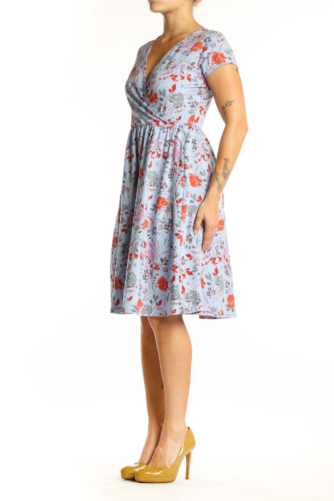 Blue floral wrap dress with orange and pink blooms, short sleeves, and gathered waist - front view