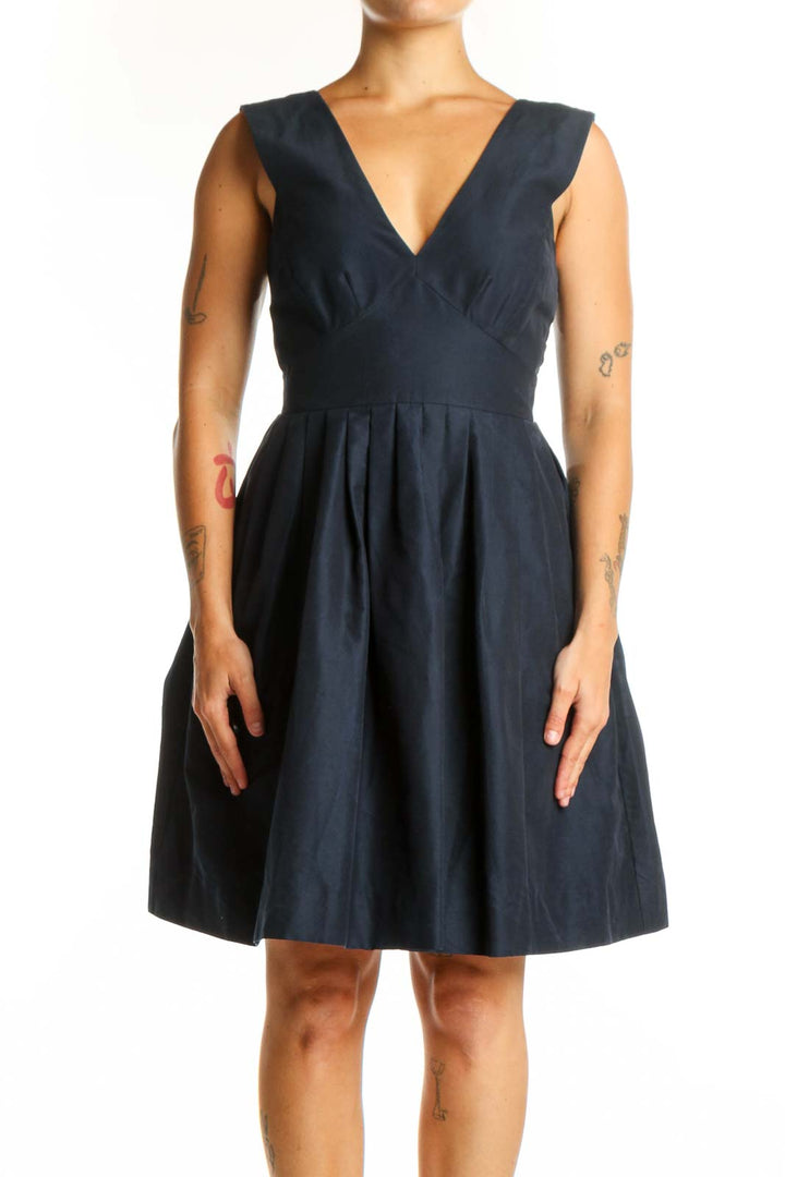 Navy V-Neck Fit and Flare Dress front view, showing flattering silhouette with pleated skirt detail