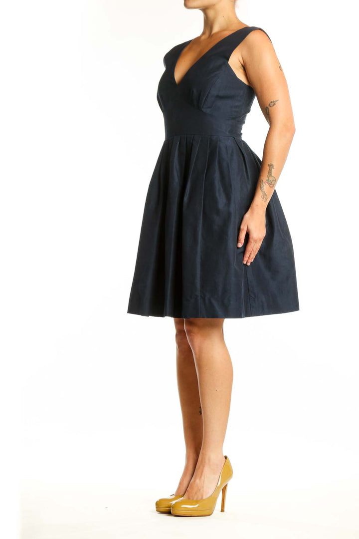 Navy V-Neck Fit and Flare Dress front view, showing flattering silhouette with pleated skirt detail