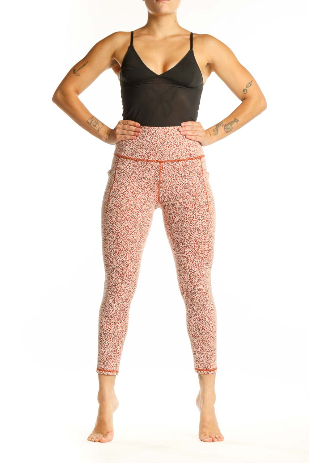 Athleta coral speckled high-waist capri leggings front view on model