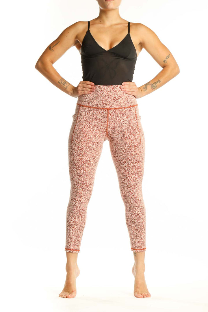 Athleta coral speckled high-waist capri leggings front view on model