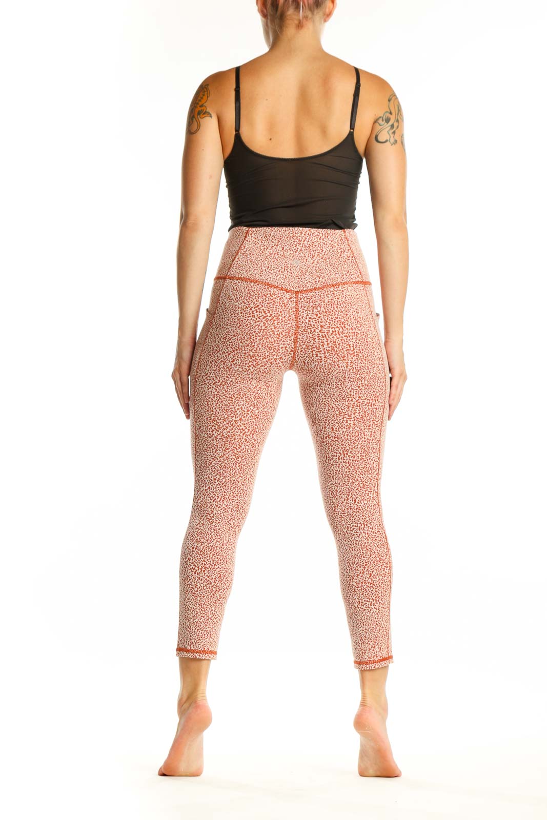 Athleta coral speckled high-waist capri leggings back view on model