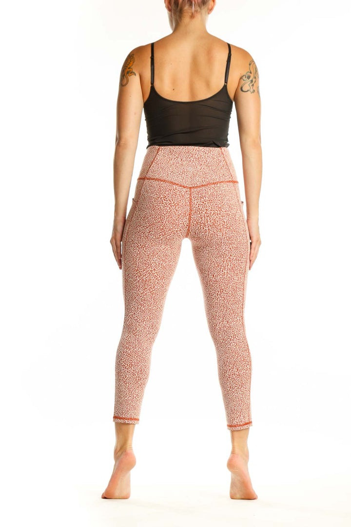 Athleta coral speckled high-waist capri leggings back view on model