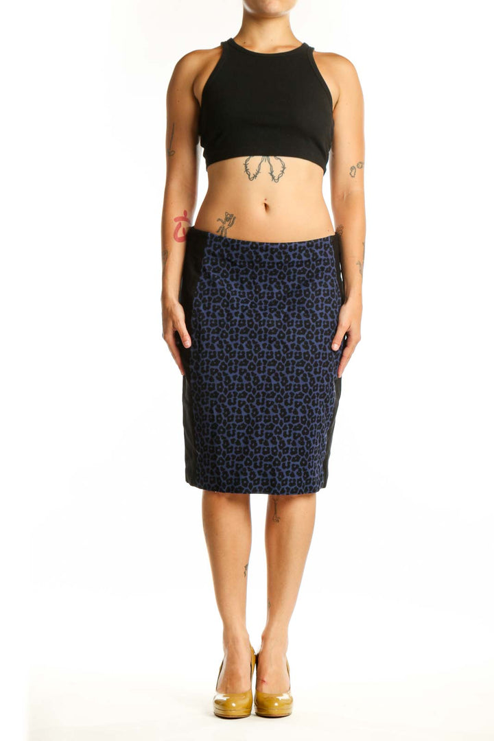 Navy leopard print pencil skirt front view, showcasing bold animal print pattern and flattering silhouette