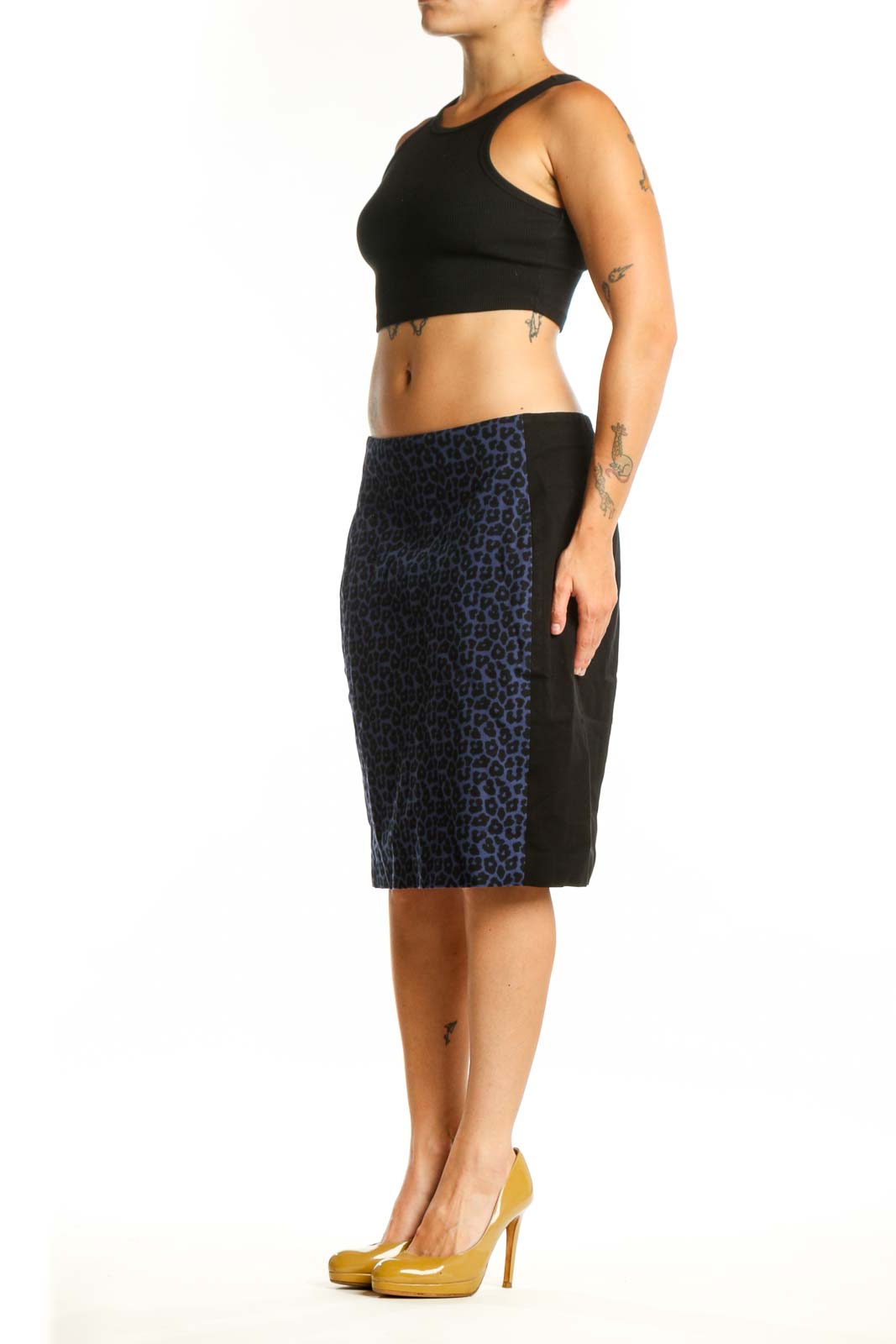 Navy leopard print pencil skirt front view, showcasing bold animal print pattern and flattering silhouette