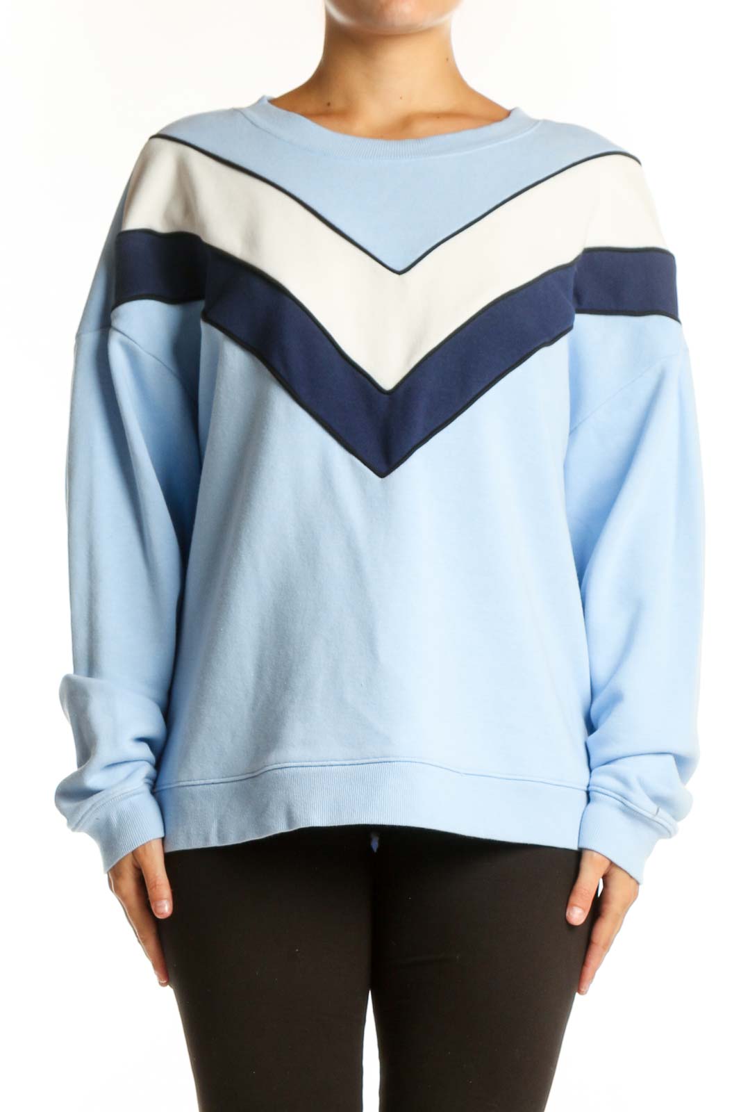 Light blue colorblock chevron sweatshirt with navy and cream geometric stripes, front view