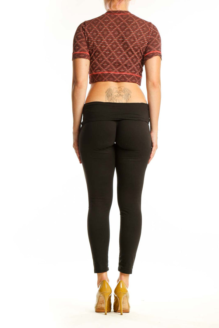 Rust heathered textured crop top knit with short sleeves, back view