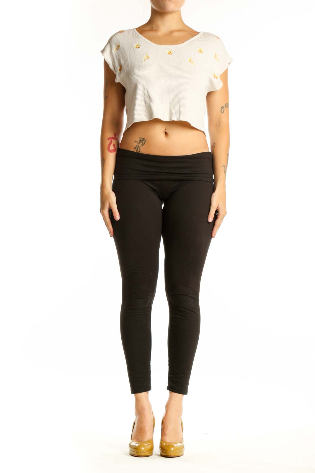 Cream ribbed crop top with gold floral embroidery, short cap sleeves, front view