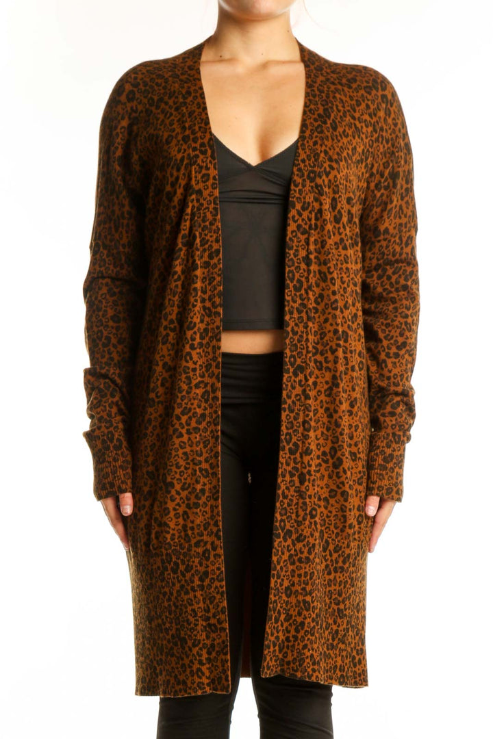 Brown leopard print knit cardigan by Sanctuary worn open over black crop top, front view
