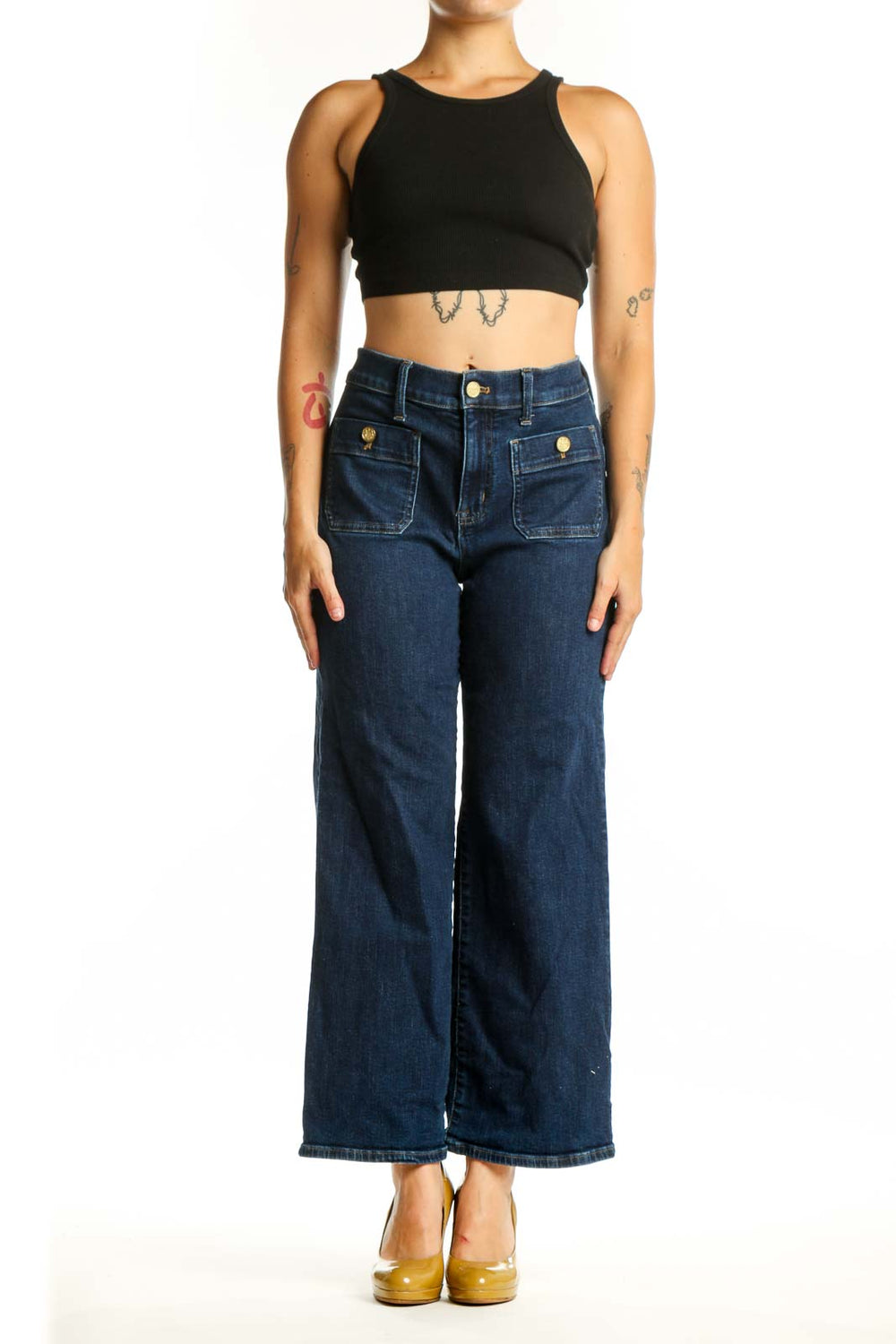 Front view of dark blue wide-leg J.Crew jeans with functional front pockets and brass button details