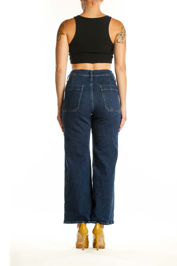 Back view of dark blue wide-leg J.Crew jeans showing cropped ankle length and classic five-pocket design