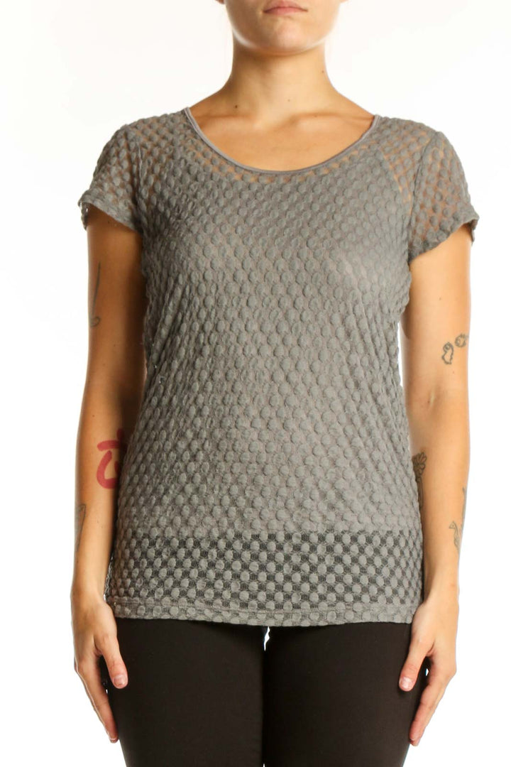 Gray textured short sleeve knit top with quilted geometric pattern, front view