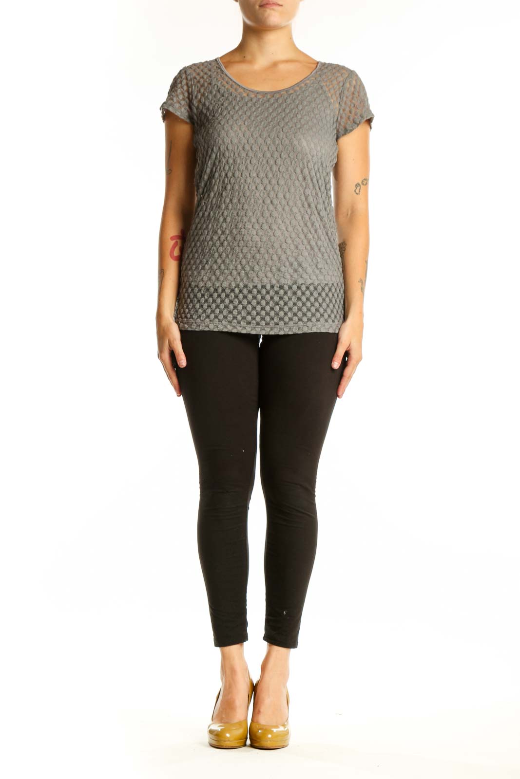 Gray textured short sleeve knit top with quilted geometric pattern, front view